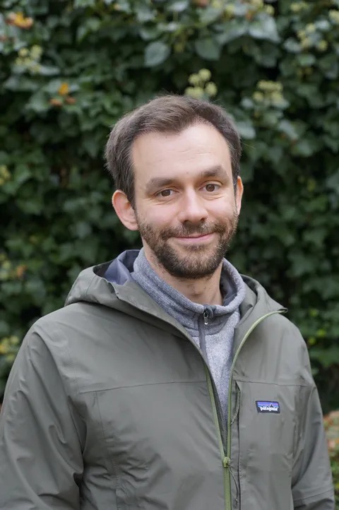 Porträtfoto von Dr. Julian Börger